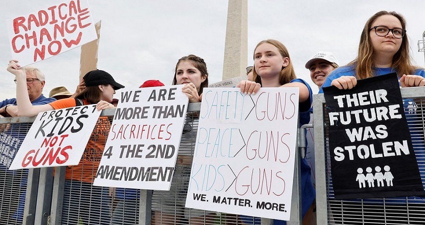 Tens of thousands rally for stricter US gun laws