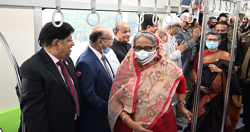 PM buys Dhaka's first metro rail ticket to become its first passenger