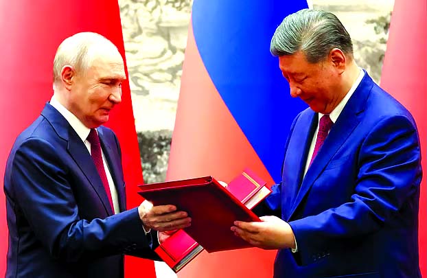 Putin, Xi hail 'unyielding' ties in talks after Trump visit