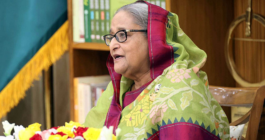 PM Hasina hands over Begum Rokeya Padak to 5 women