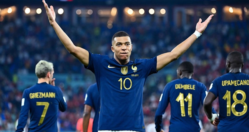 Mbappe double drives France into knockout round